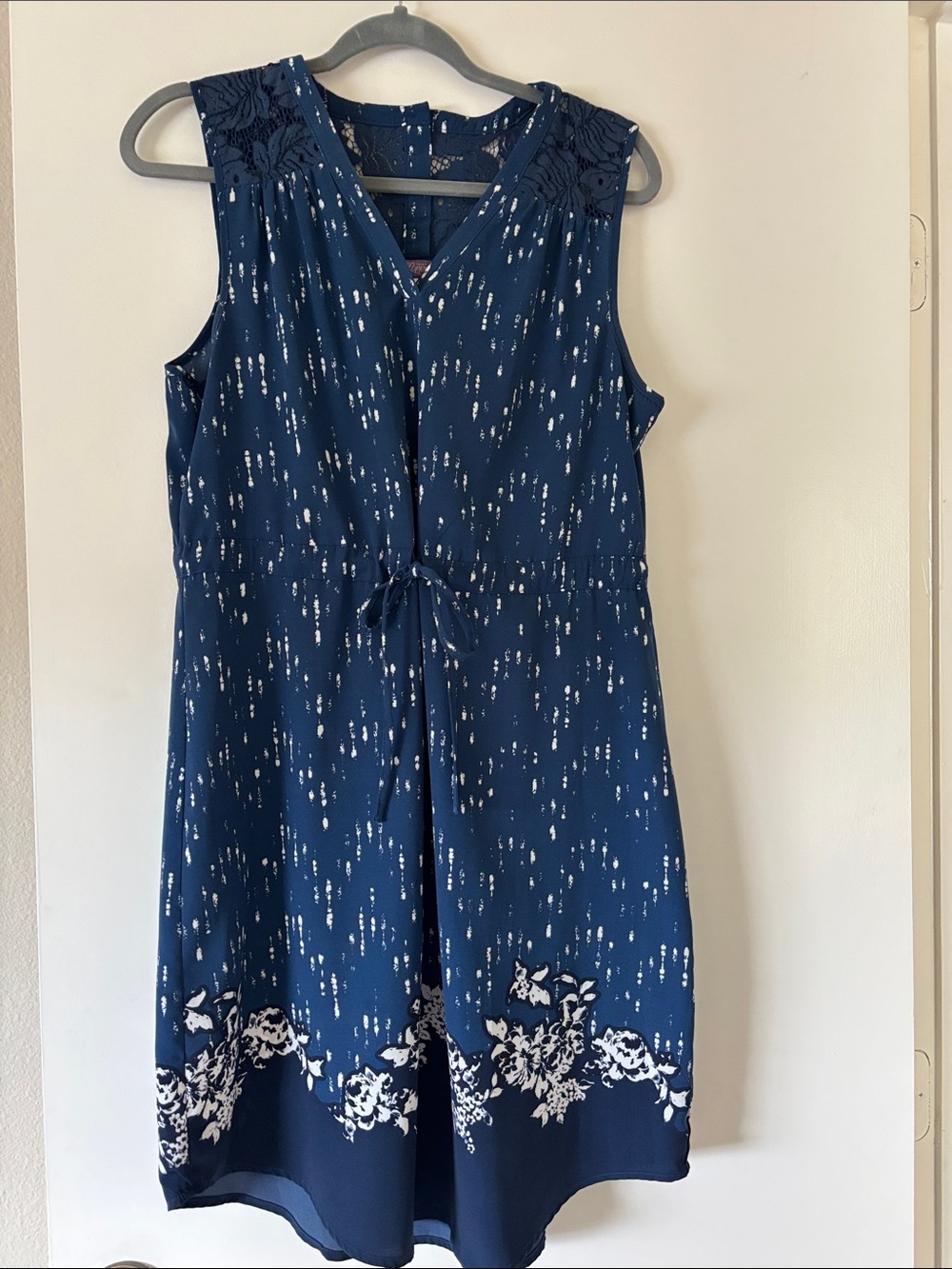 Sleeveless Navy Knee Length Dress with Floral Border and Tie Waist